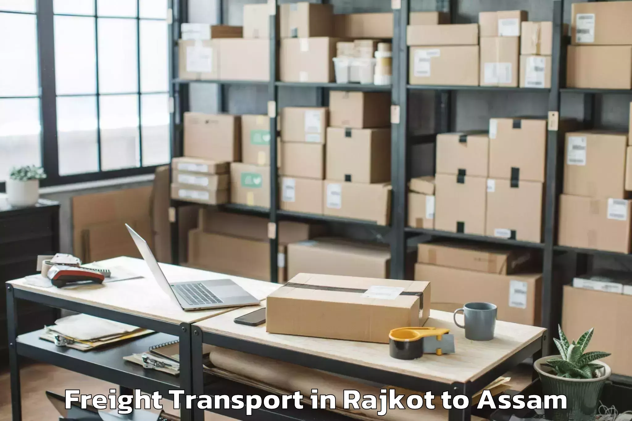 Top Rajkot to Pathorighat Pt Freight Transport Available